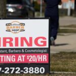 Applications for US unemployment benefits dip to 210,000 in strong job market