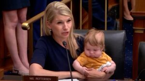 Rep. Pettersen brings baby son along as she questions Fed chairman at hearing
