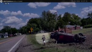 WATCH:  Toddler emerges from overturned car after police pursuit