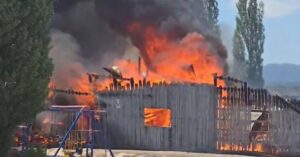 Firefighters battle fully engulfed barn fire in Wellsville