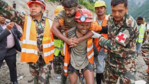 2 trapped workers rescued from a hydropower tunnel 9 days after Nepal floods
