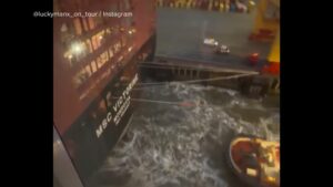 WATCH:  Cruise liner collides with two docked cargo ships