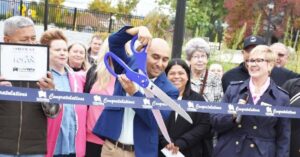 Ribbon-cutting marks opening of safe passage under Main Street for cyclists, pedestrians